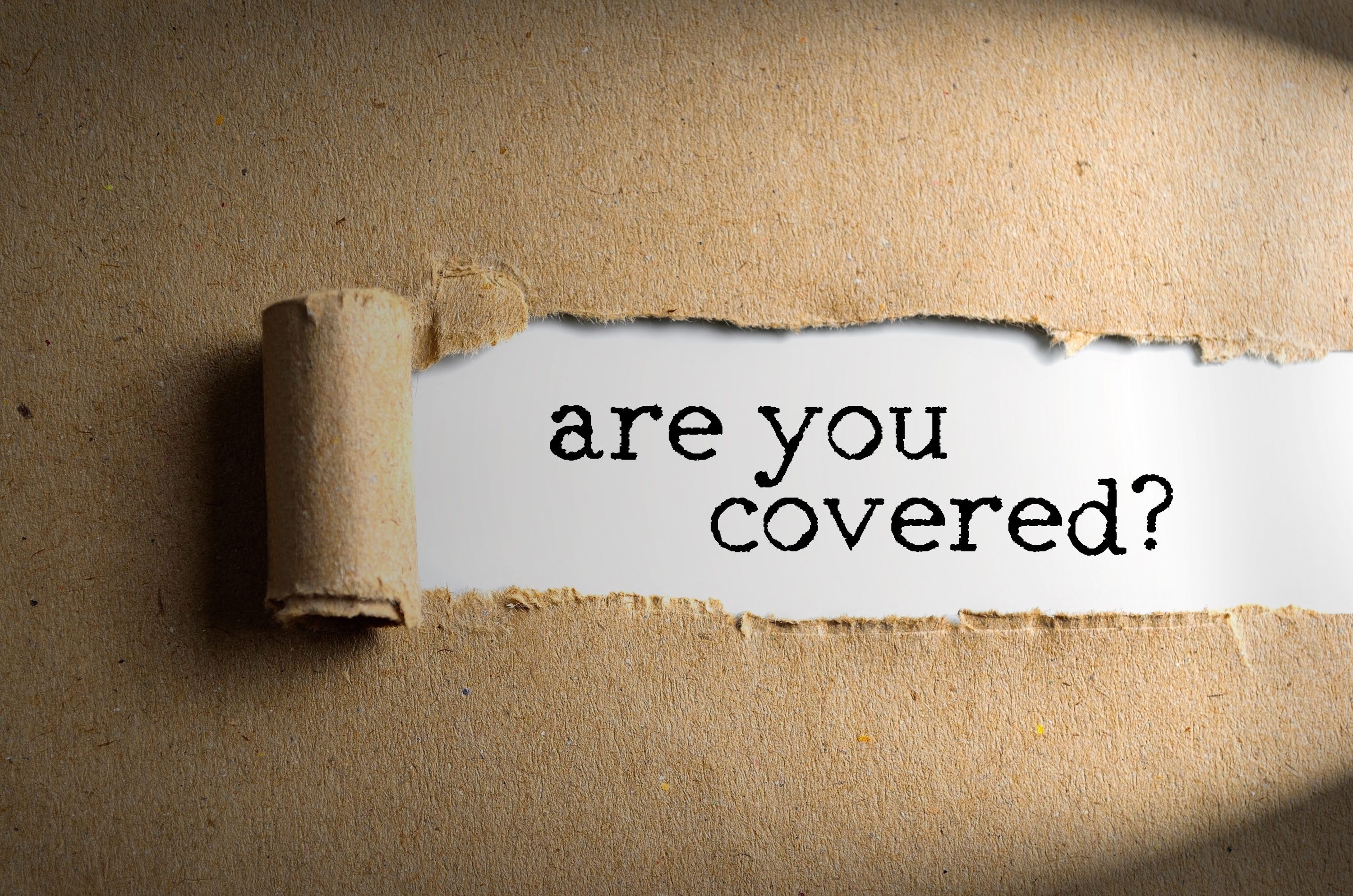 Peeled back paper revealing text: Are you covered?