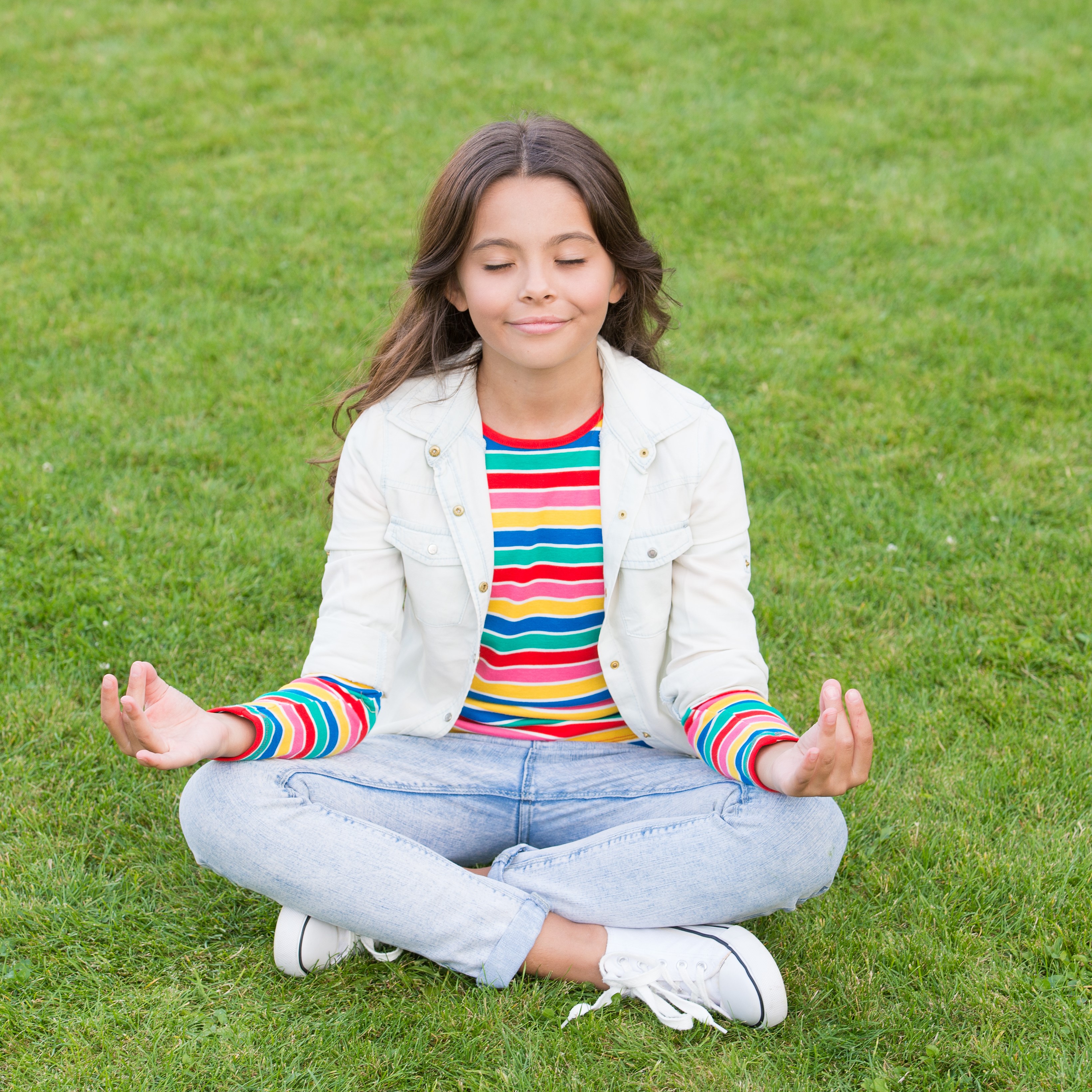 Teen girl practicing mindfulness.